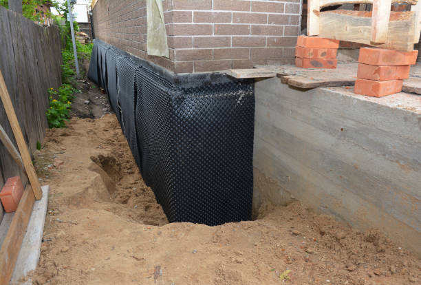 SJ Waterproofing Pros technician performing targeted Exterior Waterproofing assessment in Mosherville, MI